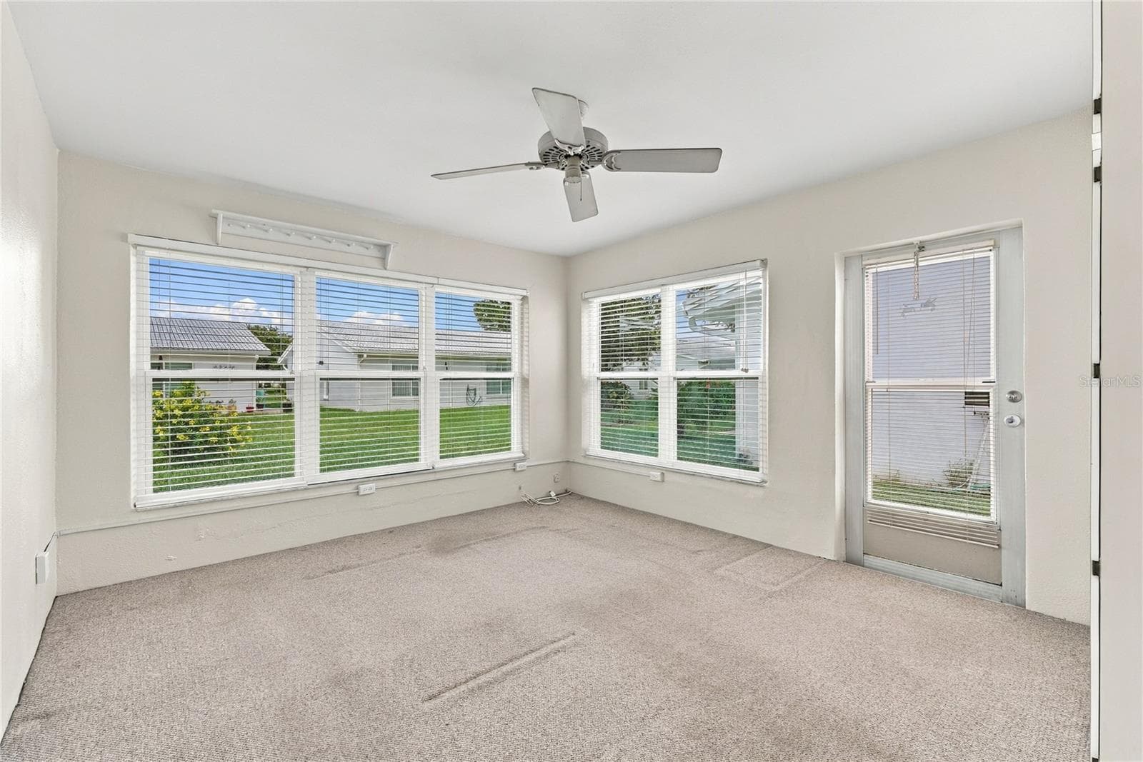 Screened in patio was turned into a bonus room. - 3939 90TH TER N, PINELLAS PARK