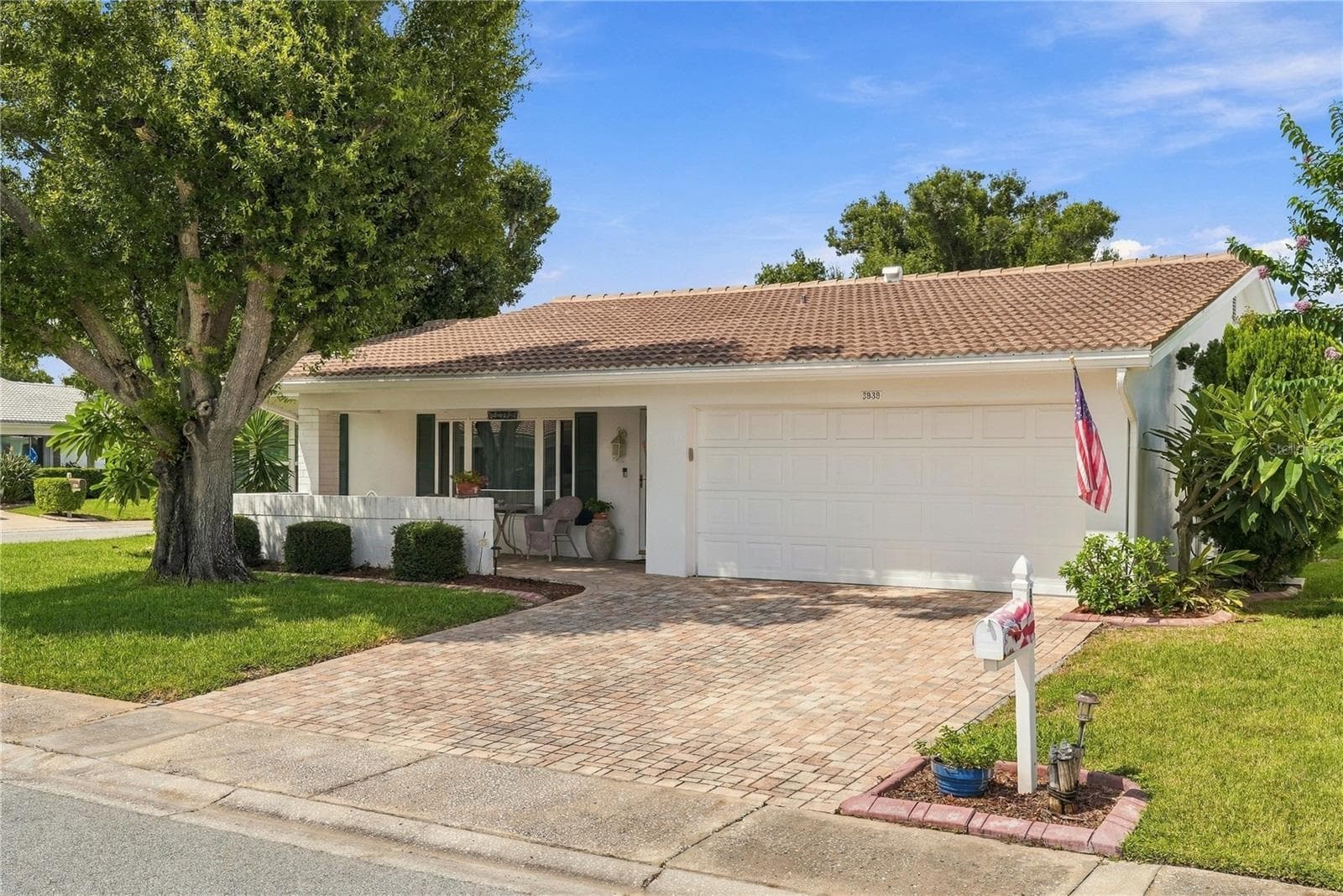 The driveway has elegant pavers leading the home. - 3939 90TH TER N, PINELLAS PARK