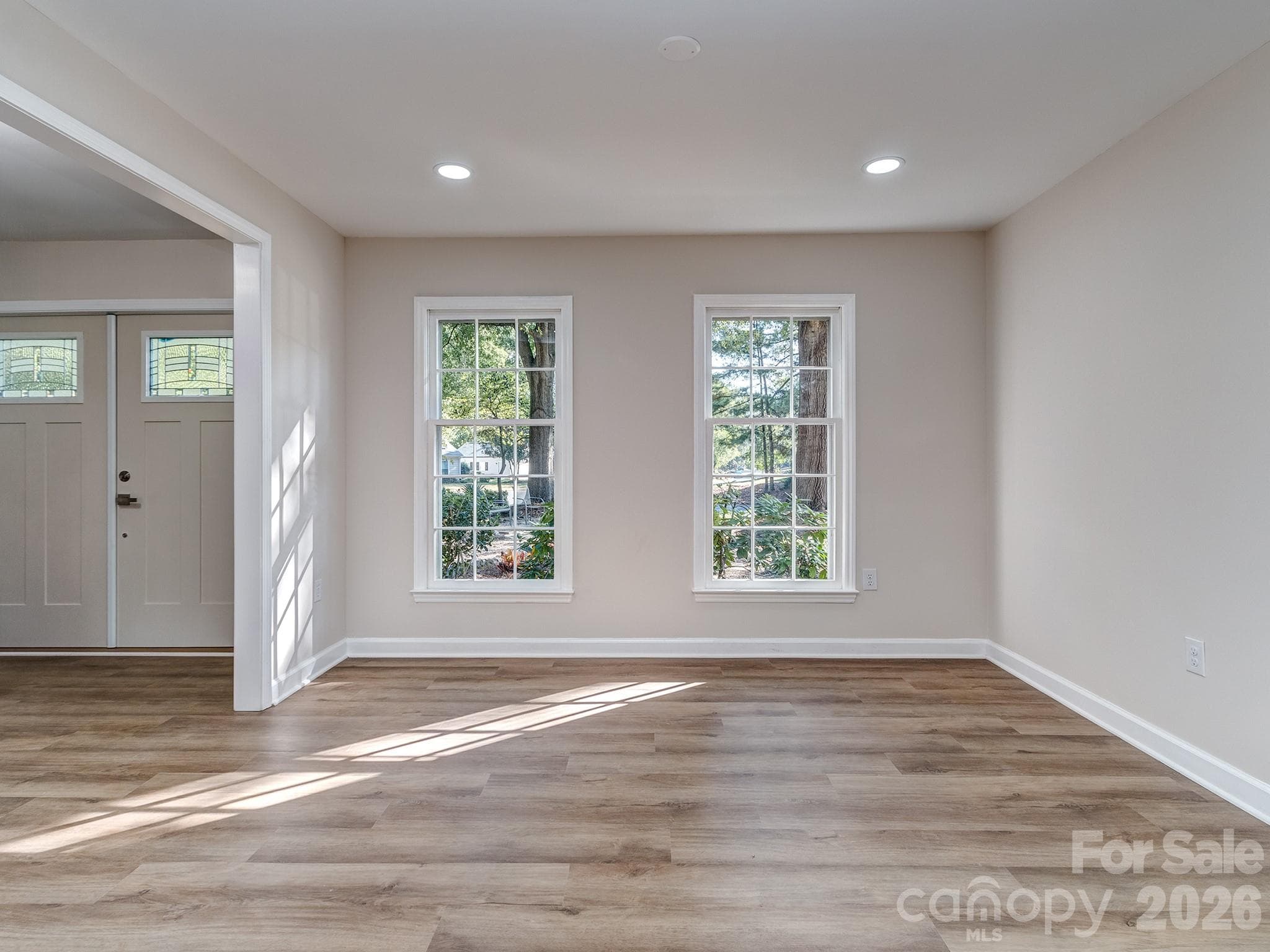 Dining Room is spacious and has dimmable lighting with electric set up for a chandelier. Room can also be used for another living space as the kitchen has an eating area as well. - 2041 Glouchester Circle, Charlotte