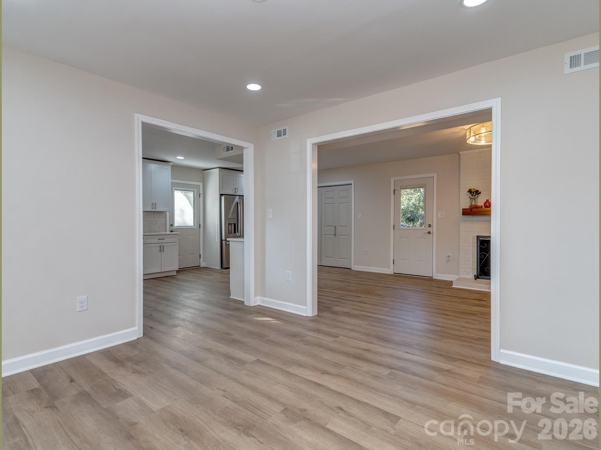 Living/Dining Room, whatever you prefer. Case opening allows for separate space but open enough to be part of adjoining spaces. - 2041 Glouchester Circle, Charlotte
