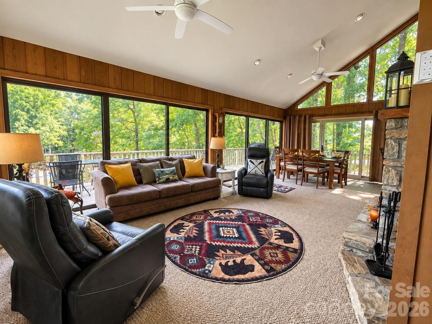Vaulted ceilings and an abundance of windows bring the beauty of sunrises, sunsets and your personal water and mountain view of the quite peaceful Bald Mnt lake right from the inside of your home. - Lake Lure