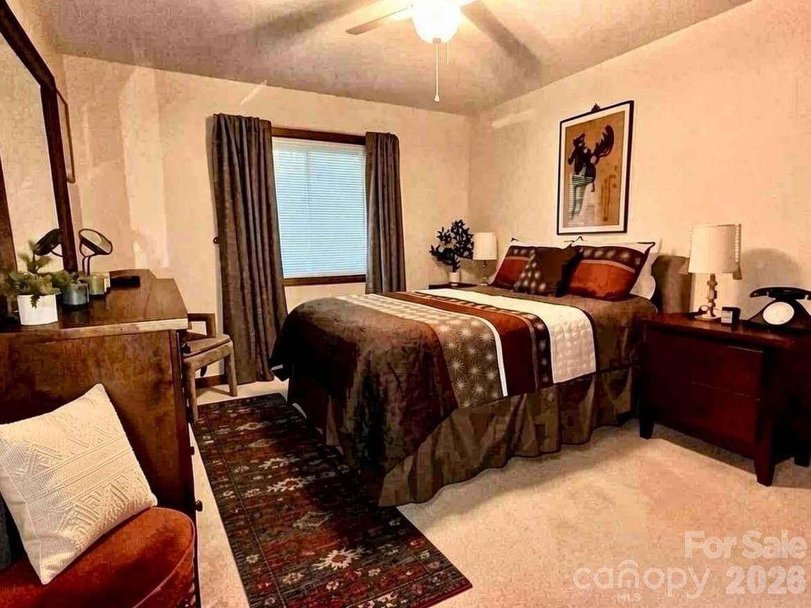 Comfortable main-level bedroom offering convenience and easy access to the heart of the home. - Lake Lure