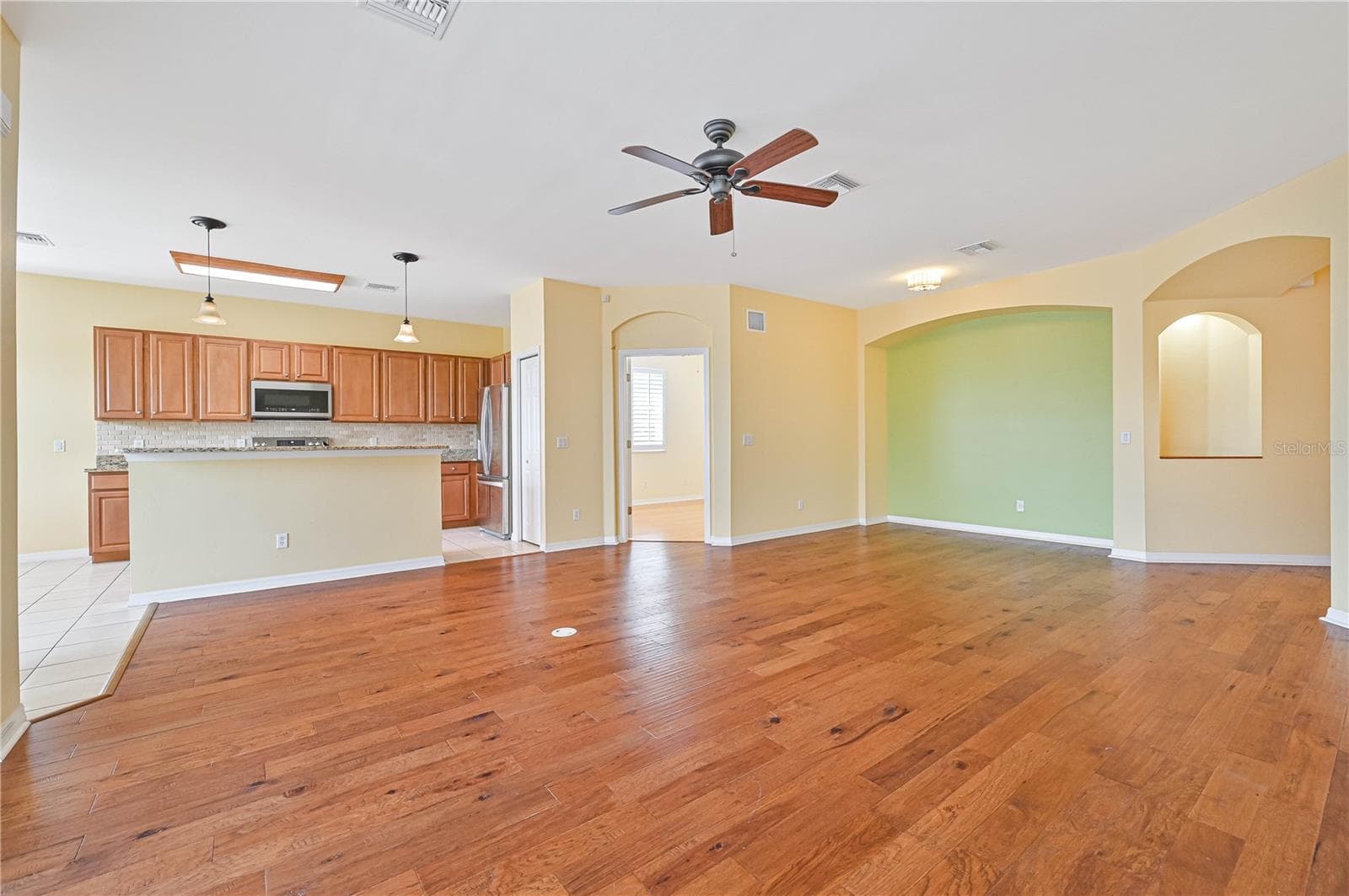 GREAT ROOM VIEW OF DINING ROOM - 17434 BOCA VISTA RD #1006, PUNTA GORDA