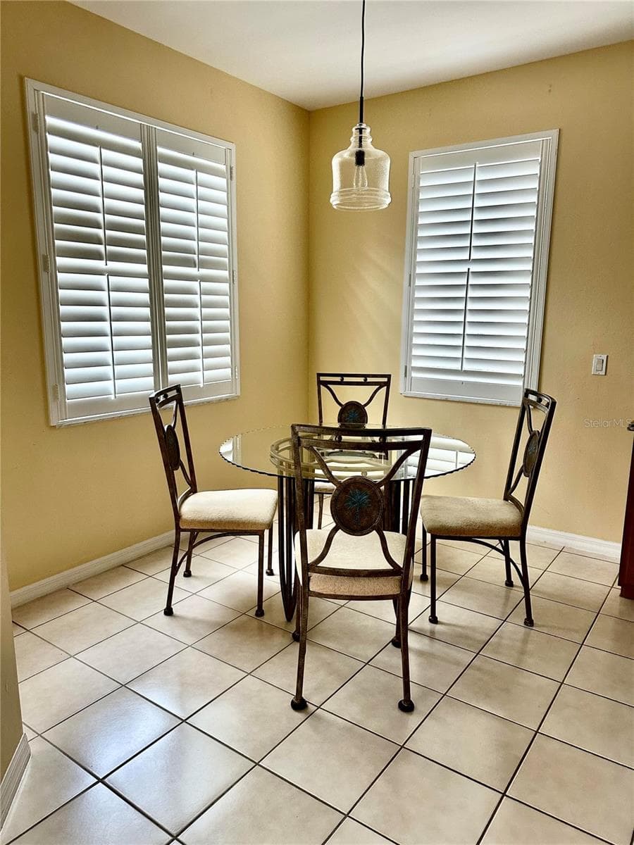 KITCHEN DINETTE AREA - 17434 BOCA VISTA RD #1006, PUNTA GORDA