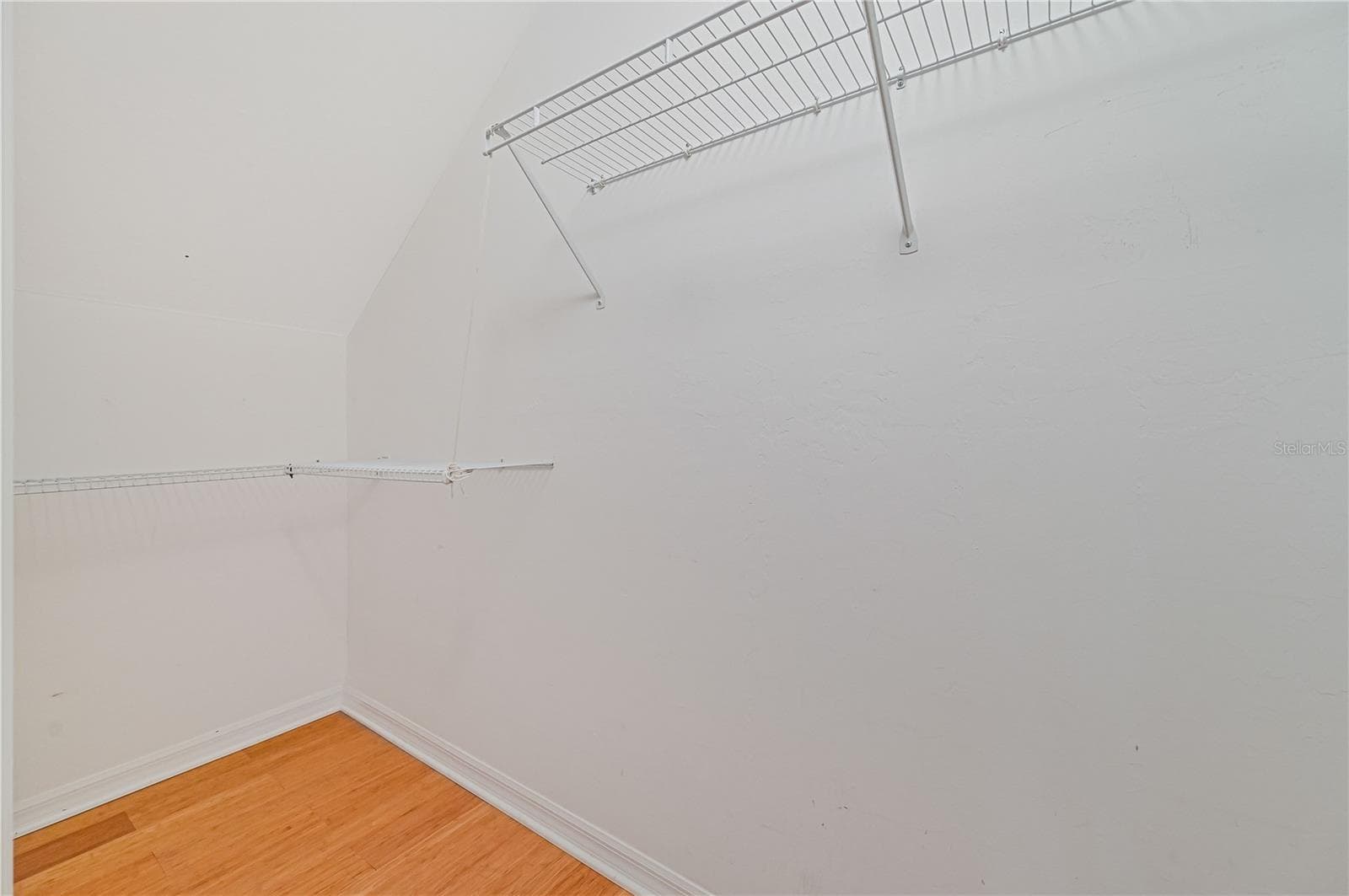GUEST BR WALK IN CLOSET - 17434 BOCA VISTA RD #1006, PUNTA GORDA