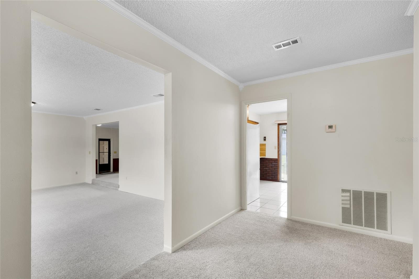 Foyer-Looking Into Living Rm and Kitchen - 133 MOORES TRL, PALATKA