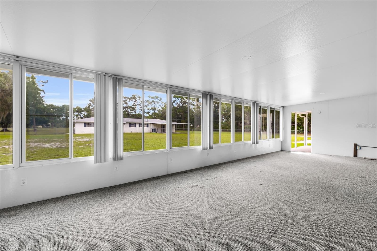 MH - Great Room - 133 MOORES TRL, PALATKA
