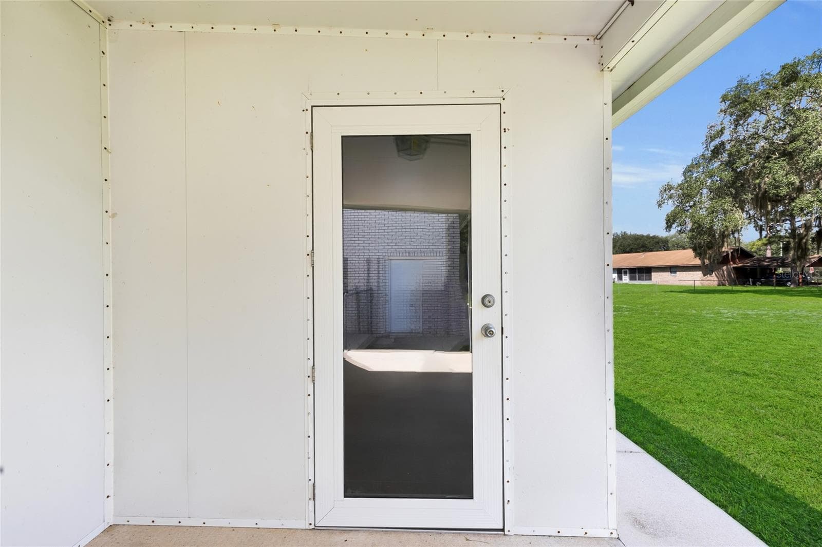MH - Front Door - 133 MOORES TRL, PALATKA