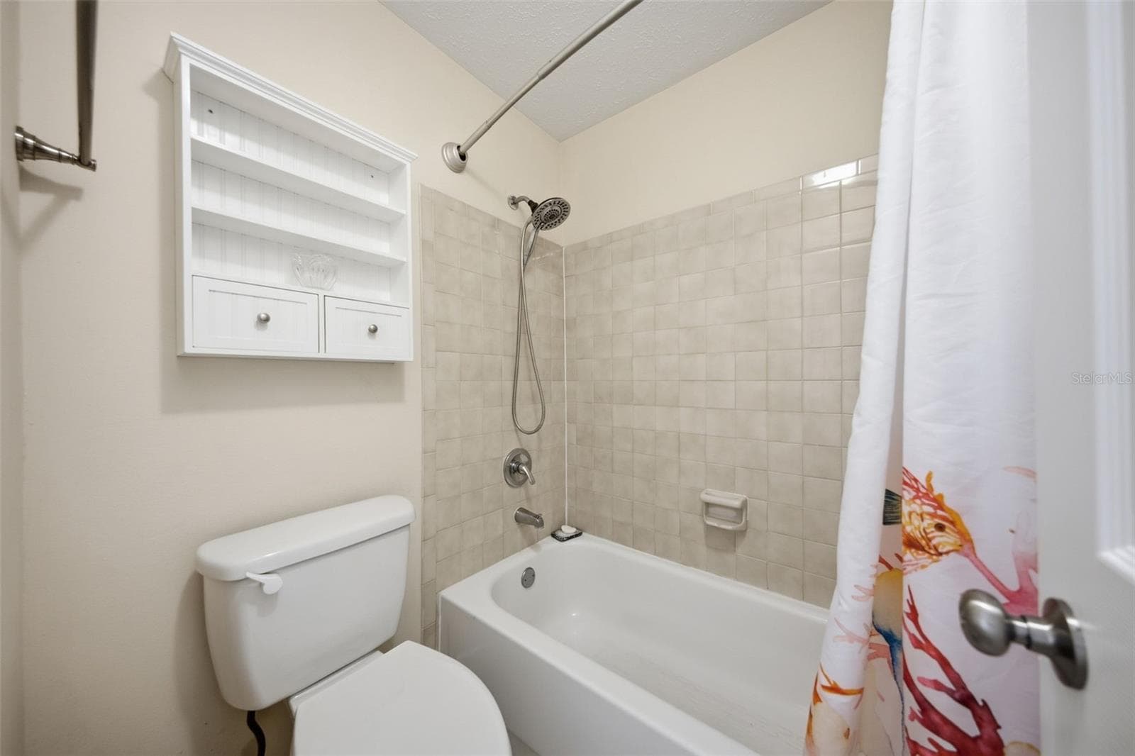 Primary shower & toilet have a door for privacy - 6809 S SHERIDAN RD, TAMPA