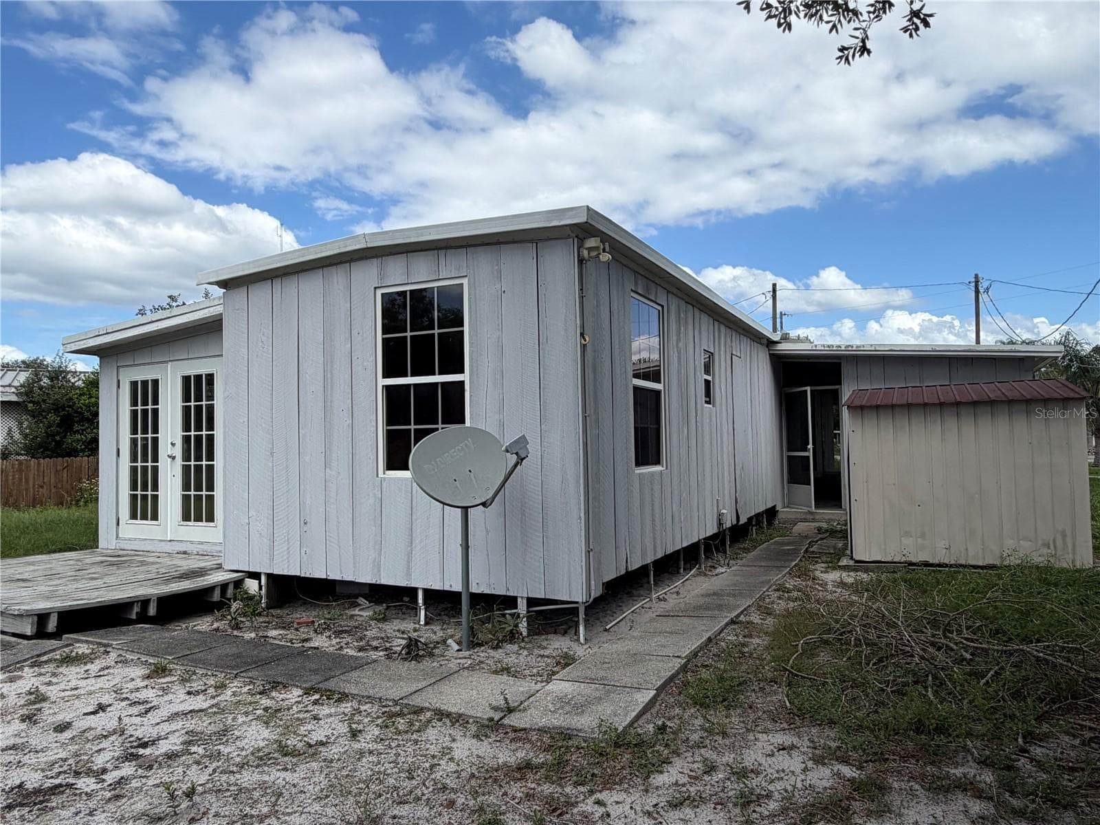 Back of the house - 26143 ROSE LN, ASTATULA