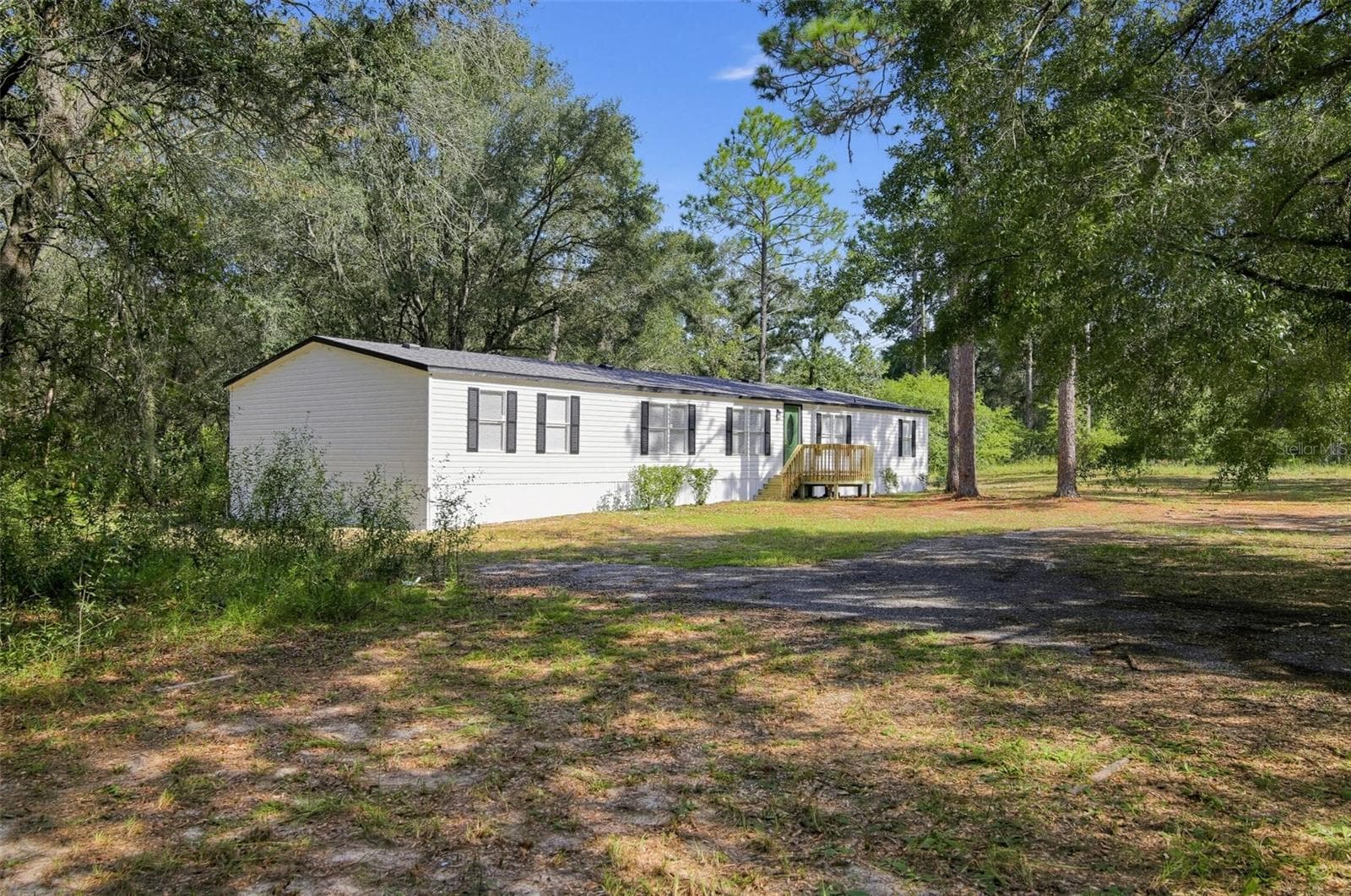 Manufactured Home at 124 HOUR GLASS CIR, HAWTHORNE, photo 3 of 30