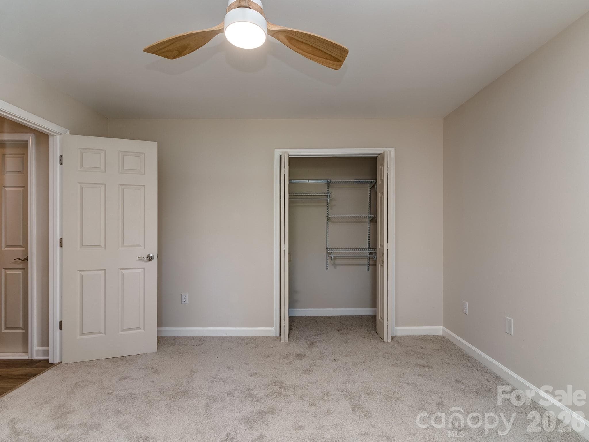 Bedroom #4 is also carpeted with a nice size closet with organized shelving. - 2041 Glouchester Circle, Charlotte