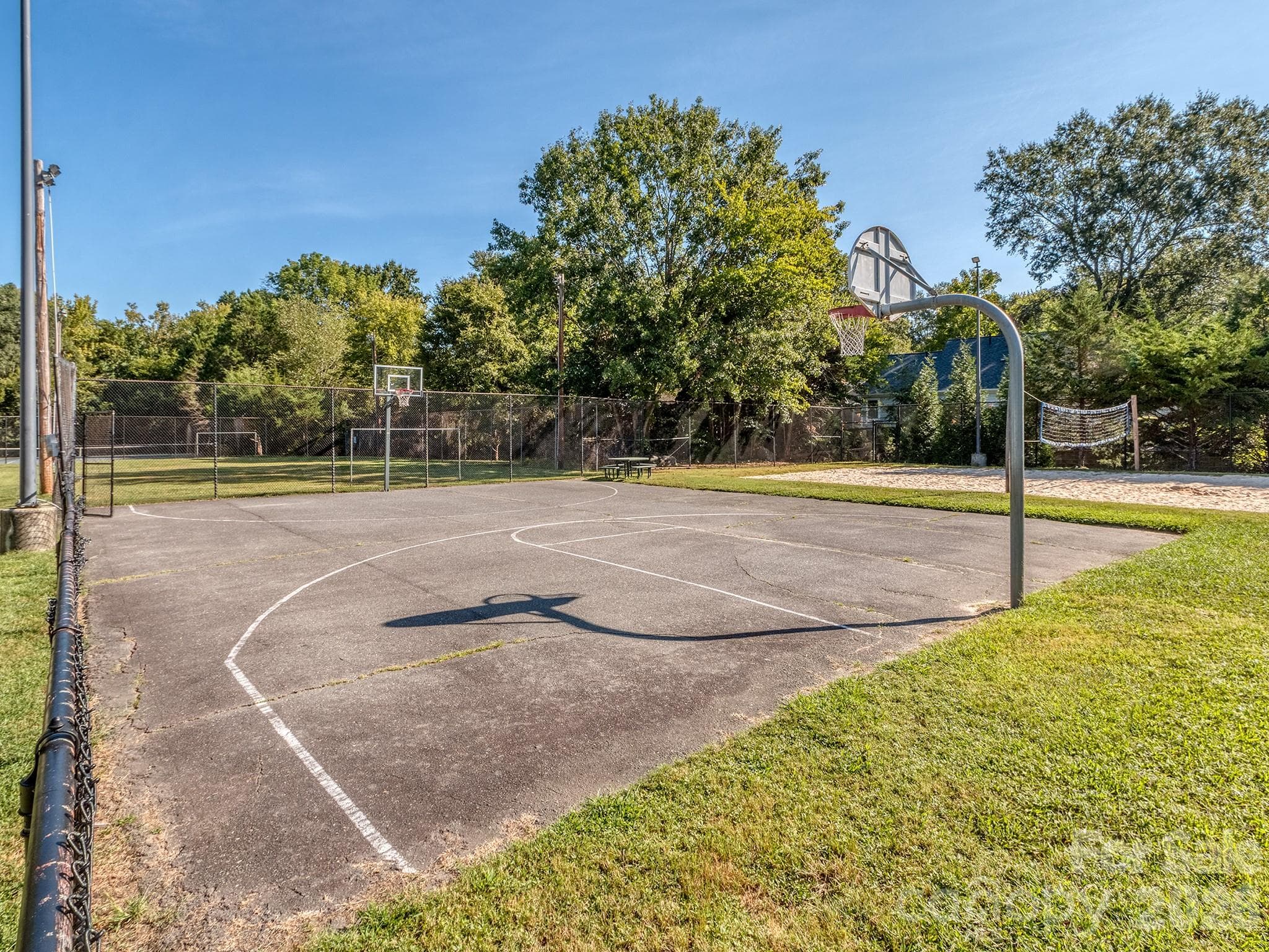 Basketball and volleyball areas for fun and competition. - 2041 Glouchester Circle, Charlotte