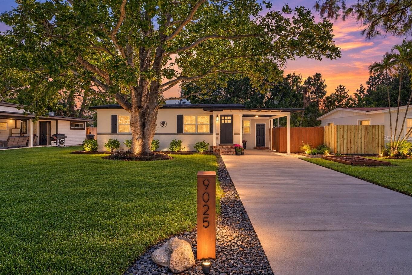 Attention to detail with landscaping and lighting. - 9025 1ST ST NE, ST PETERSBURG