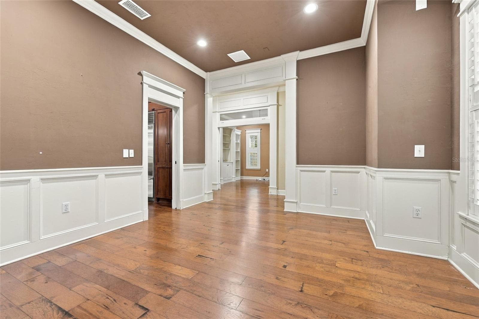 Formal Dining Room with custom plantation shutters - 734 SW 134TH WAY, NEWBERRY