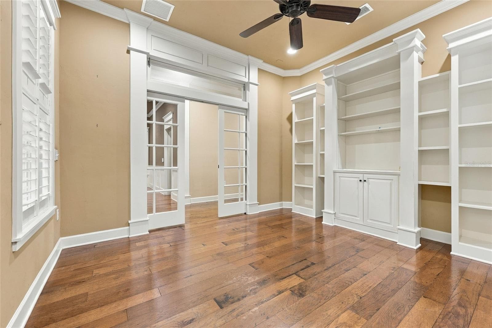 Study with custom built-ins (downstairs) - 734 SW 134TH WAY, NEWBERRY