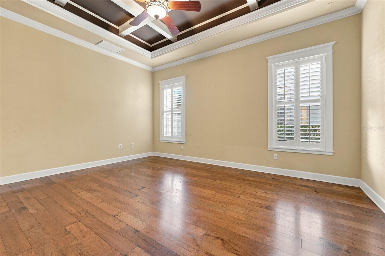 Primary Bedroom Suite with dramatic coffered ceiling feature - 734 SW 134TH WAY, NEWBERRY