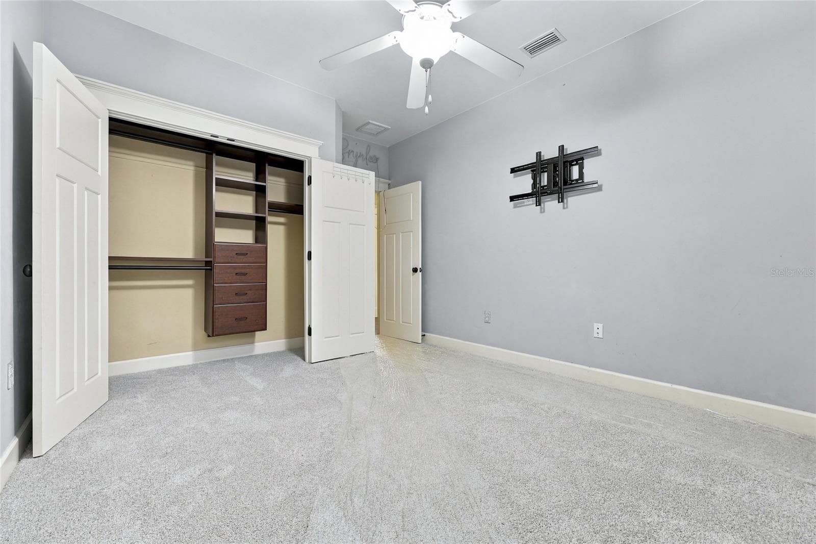 Upstairs Bedroom #1 with custom shelving - 734 SW 134TH WAY, NEWBERRY