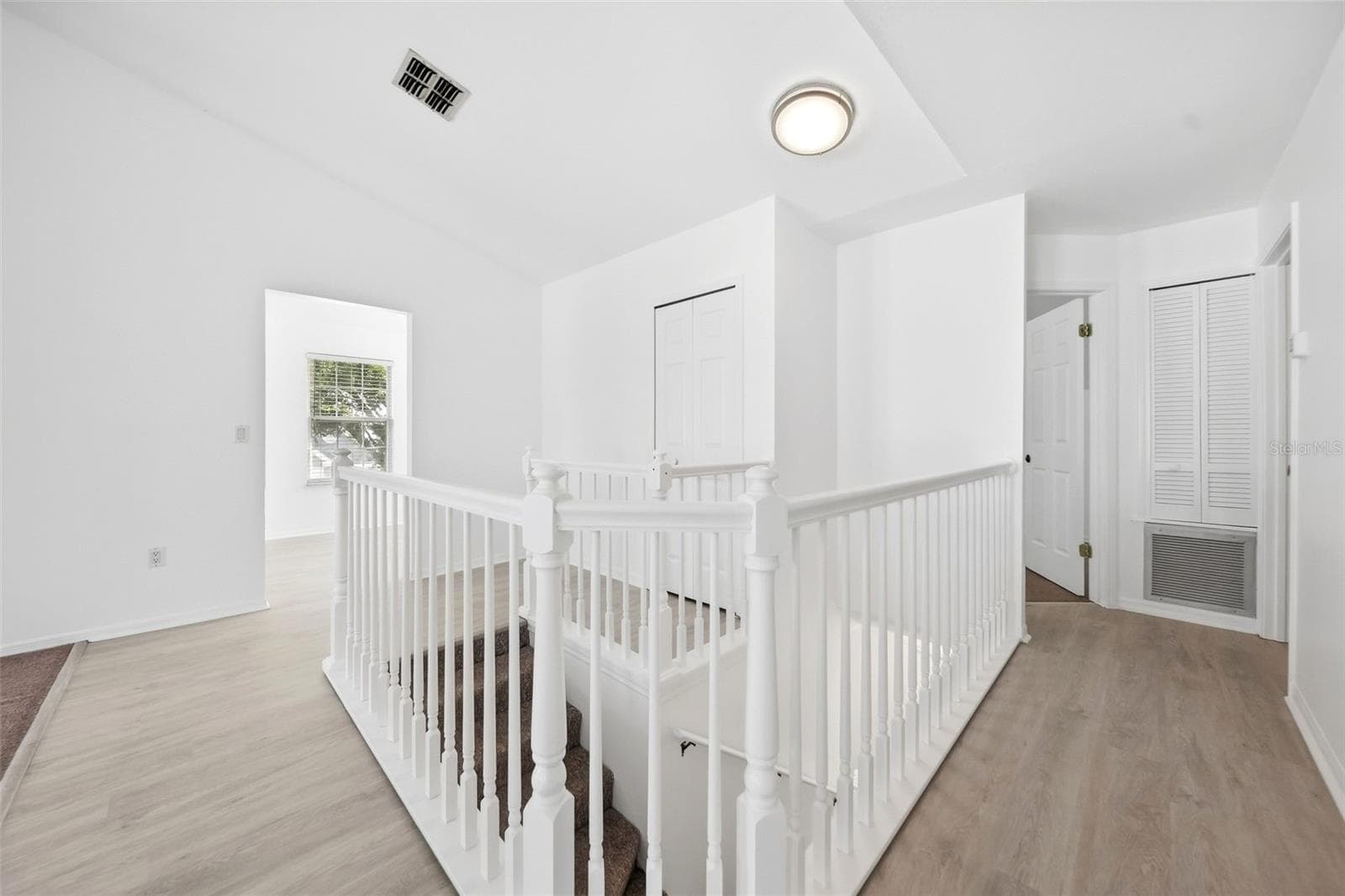 Hallway to additional rooms - 2210 COACH HOUSE BLVD #408, ORLANDO