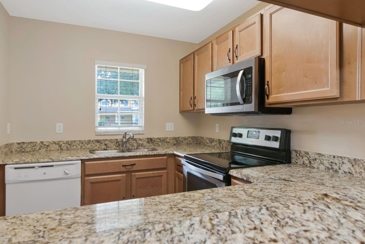 Townhouse at 37608 DALIHA TER, ZEPHYRHILLS, photo 9 of 41