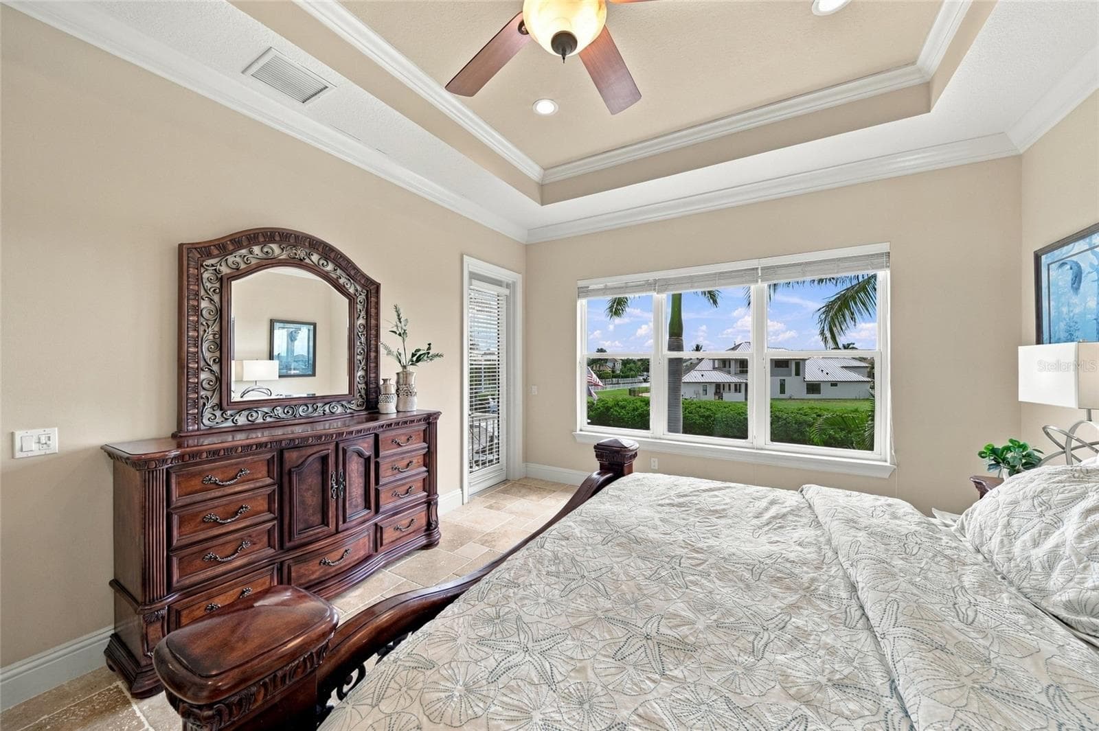 Primary Bedroom with door to balcony - 613 REGATTA WAY, BRADENTON