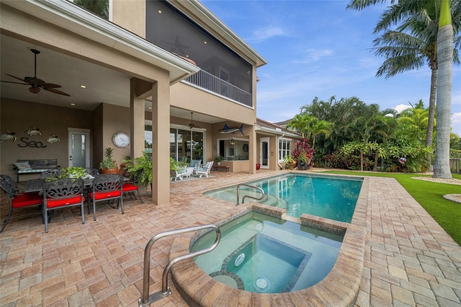 Spa near outdoor kitchen eating space - 613 REGATTA WAY, BRADENTON