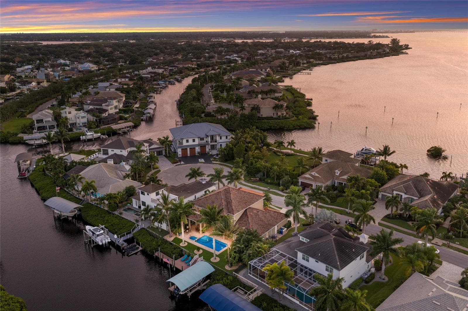 2 houses down is the turn to the main channel - 613 REGATTA WAY, BRADENTON