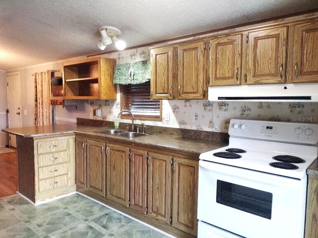Manufactured Home at 1176 COUNTY ROAD 305, BUNNELL, photo 2 of 31