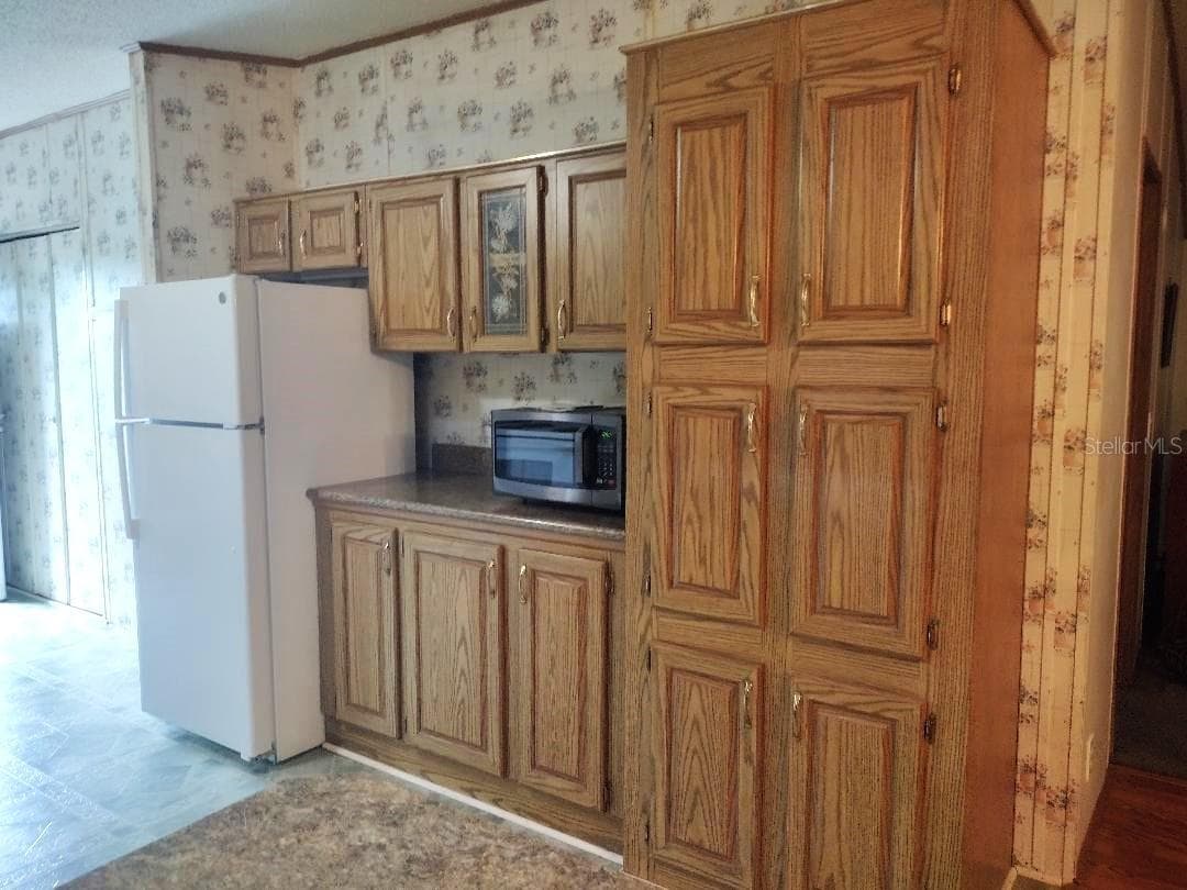 Manufactured Home at 1176 COUNTY ROAD 305, BUNNELL, photo 5 of 31