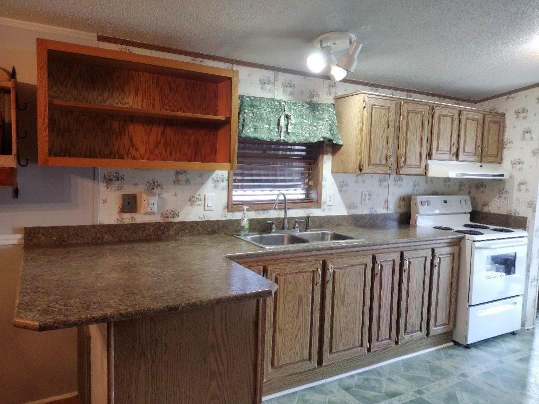 Manufactured Home at 1176 COUNTY ROAD 305, BUNNELL, photo 6 of 31