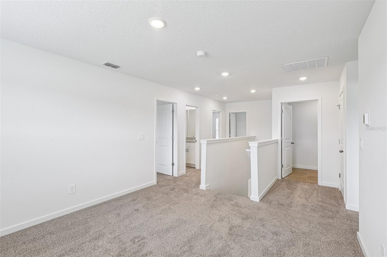 The interior photos are of another home with the same floor plan but different interior color package finishes. Some details may vary - 89 WANDERING CREEK WAY, PALM COAST