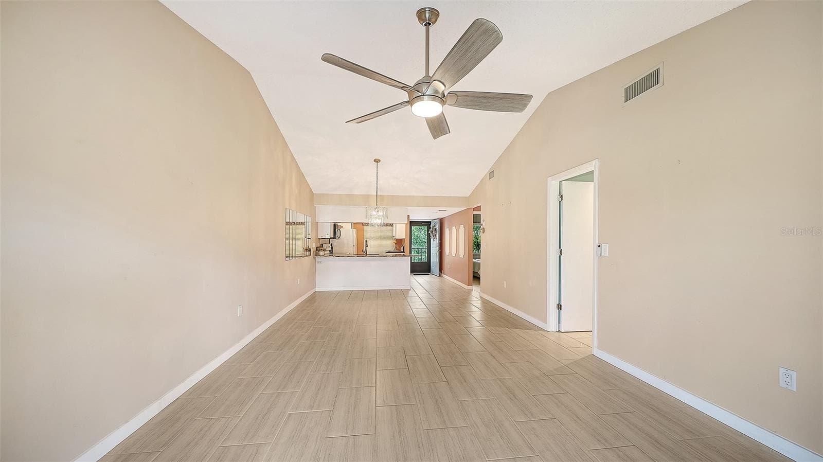 Living Room and Dining Room Areas - Open Floor Plan. - 7652 EAGLE CREEK DR #7598, SARASOTA