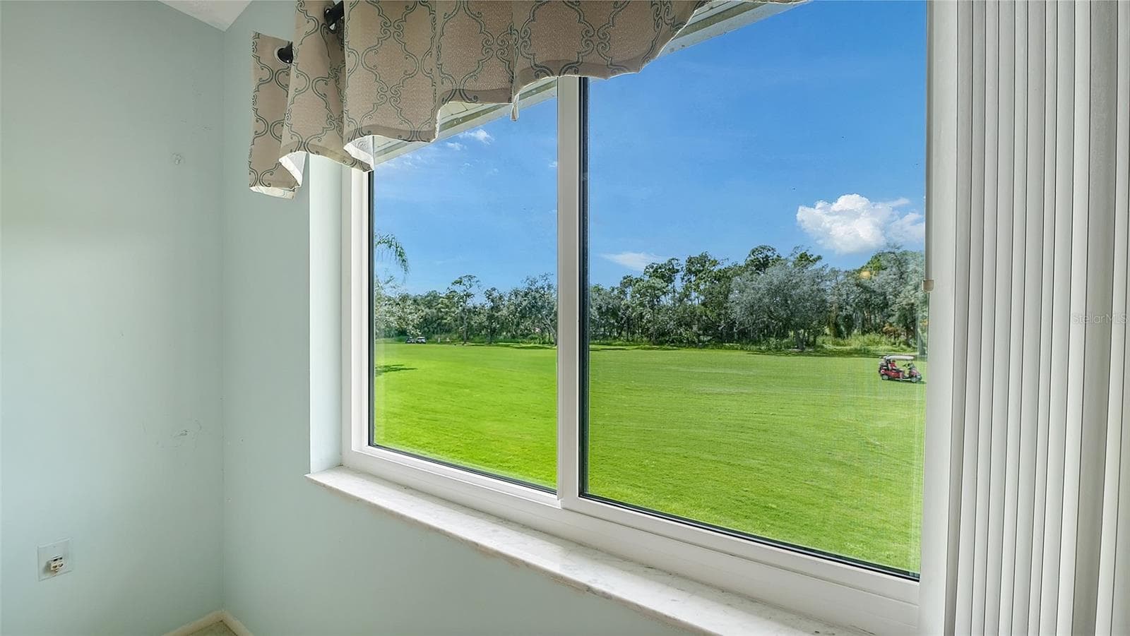 Bonus feature! Updated Hurricane Windows in Both Bedrooms & Kitchen!!  Gorgeous day for a round of Golf! - 7652 EAGLE CREEK DR #7598, SARASOTA