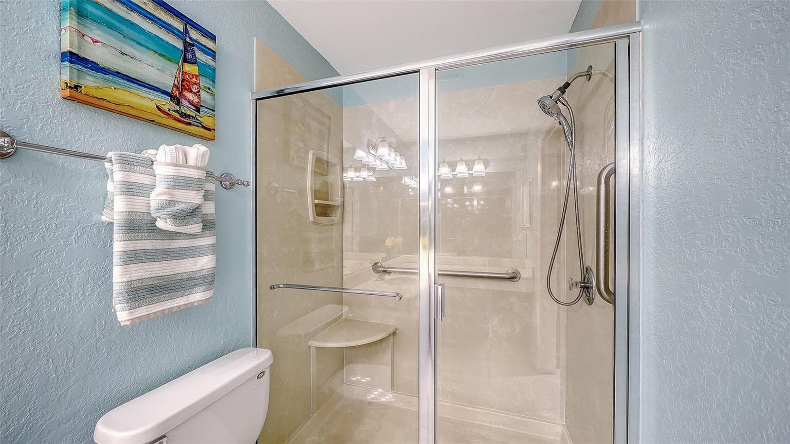 Primary Bath features newer Shower (tub replaced with Shower)! - 7652 EAGLE CREEK DR #7598, SARASOTA