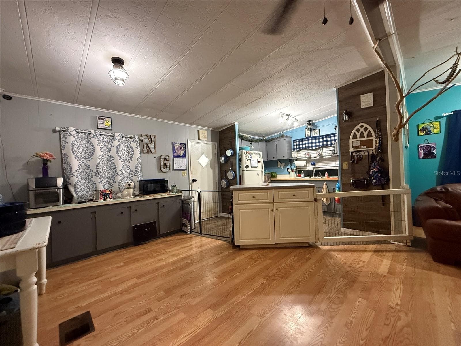 DINING ROOM & KITCHEN VIEW FROM HALLWAY - 11110 SE 66TH TER, BELLEVIEW
