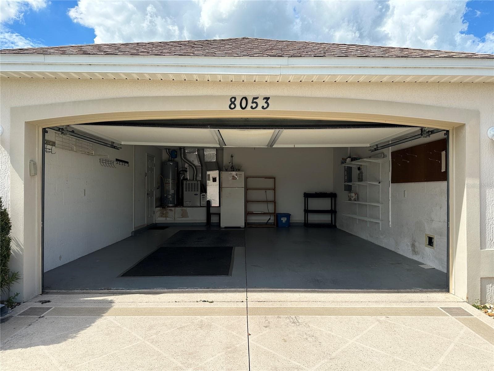 Clean spacious garage with EXTRA refrigerator - 8053 SE 171ST MCALPIN ST, THE VILLAGES