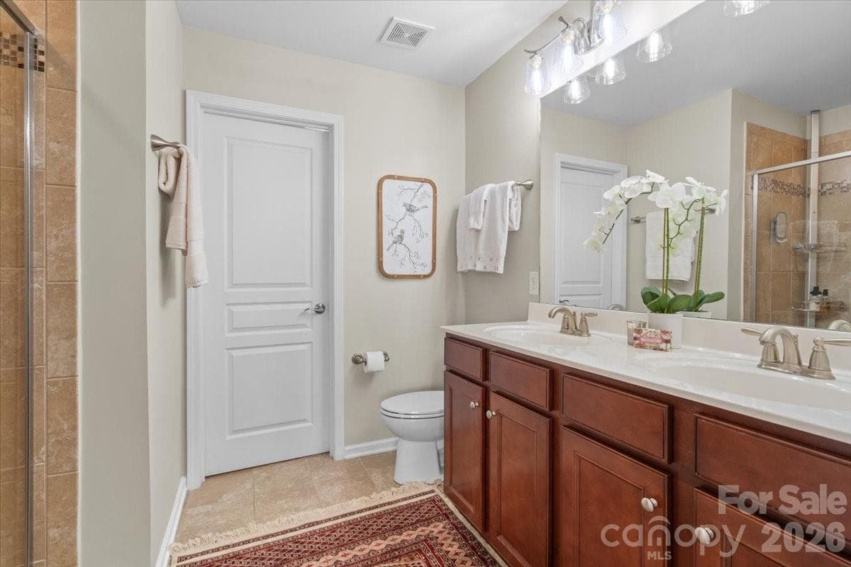 Primary Bath, dual vanity - 6437 Silver Star Lane, Charlotte