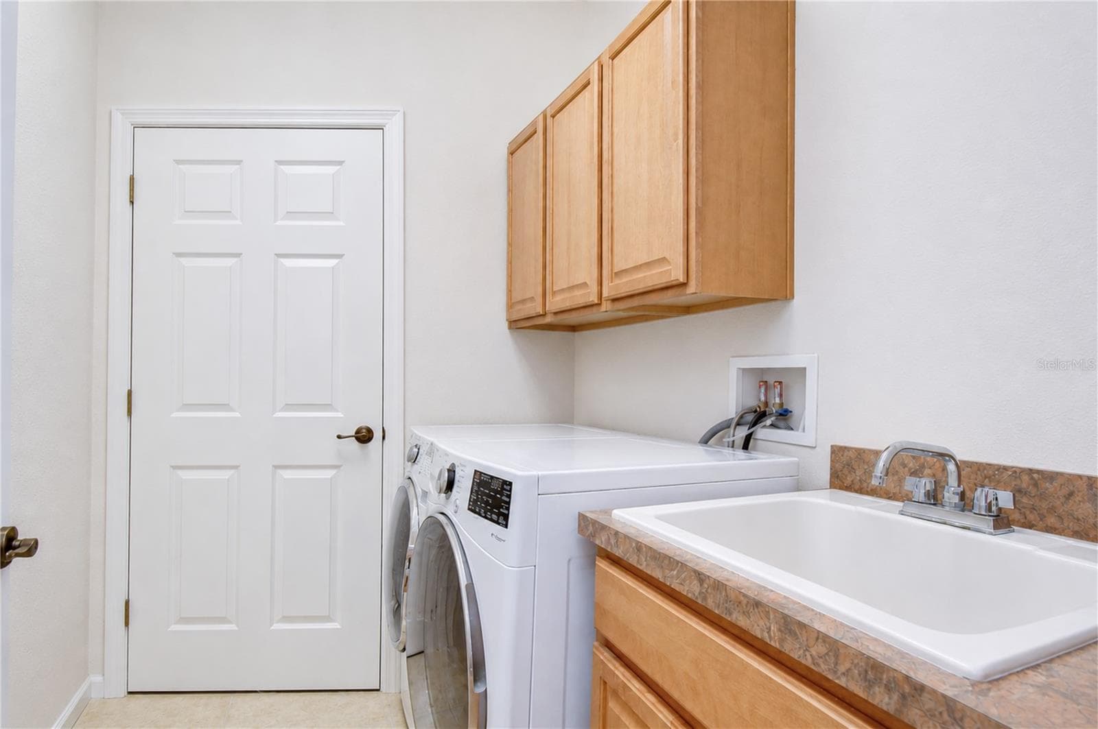 laundry room - 6806 MUNCASTER CT, TAMPA