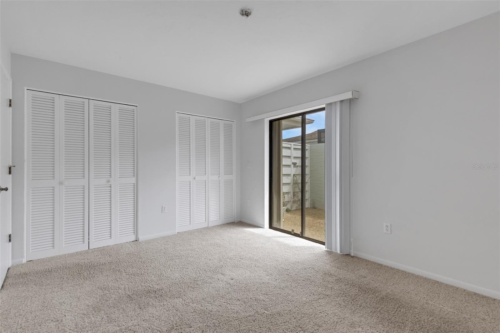 Second Bedroom - Wall of Built-in Closets - 4465 ATWOOD CAY CIR #12, SARASOTA