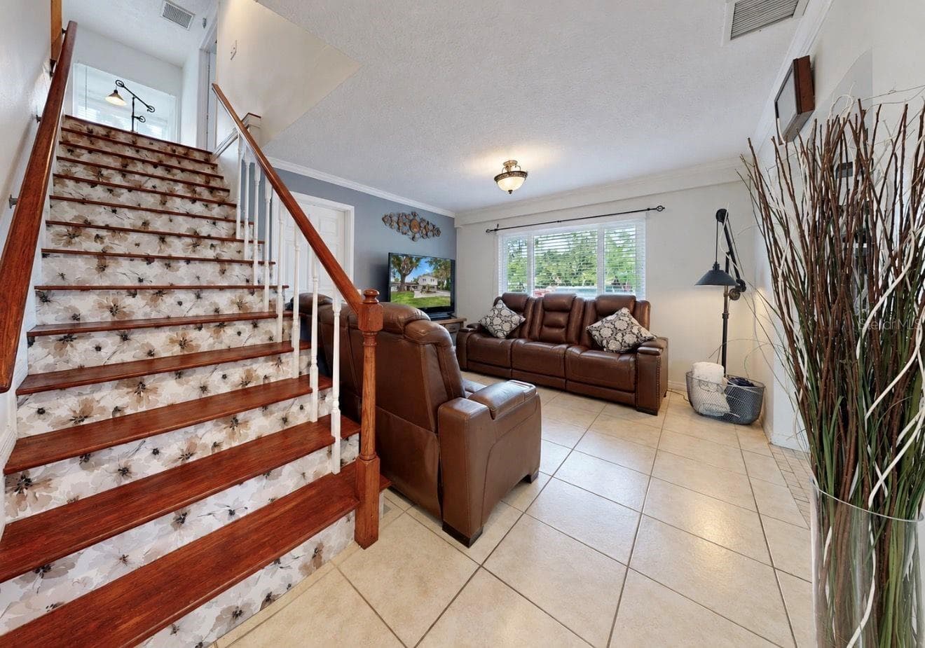 Family room-stairwell - 11004 RIVERVIEW DR, RIVERVIEW
