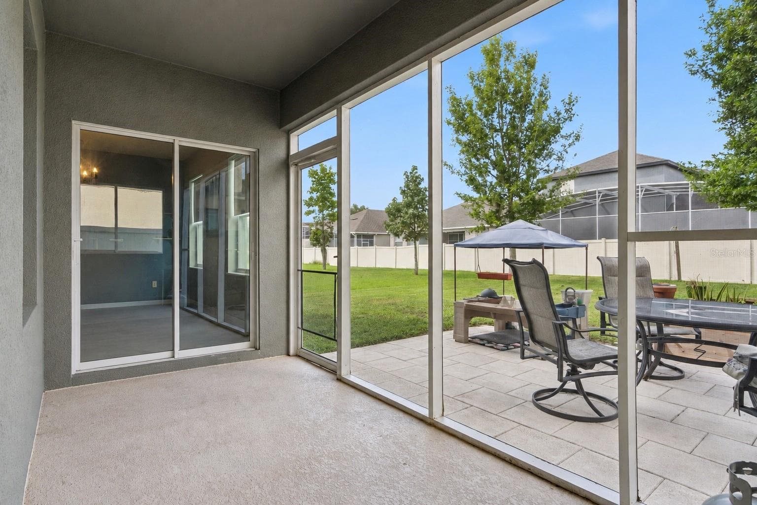 Rear Screened porch and patio - 2815 MONTICELLO WAY, KISSIMMEE