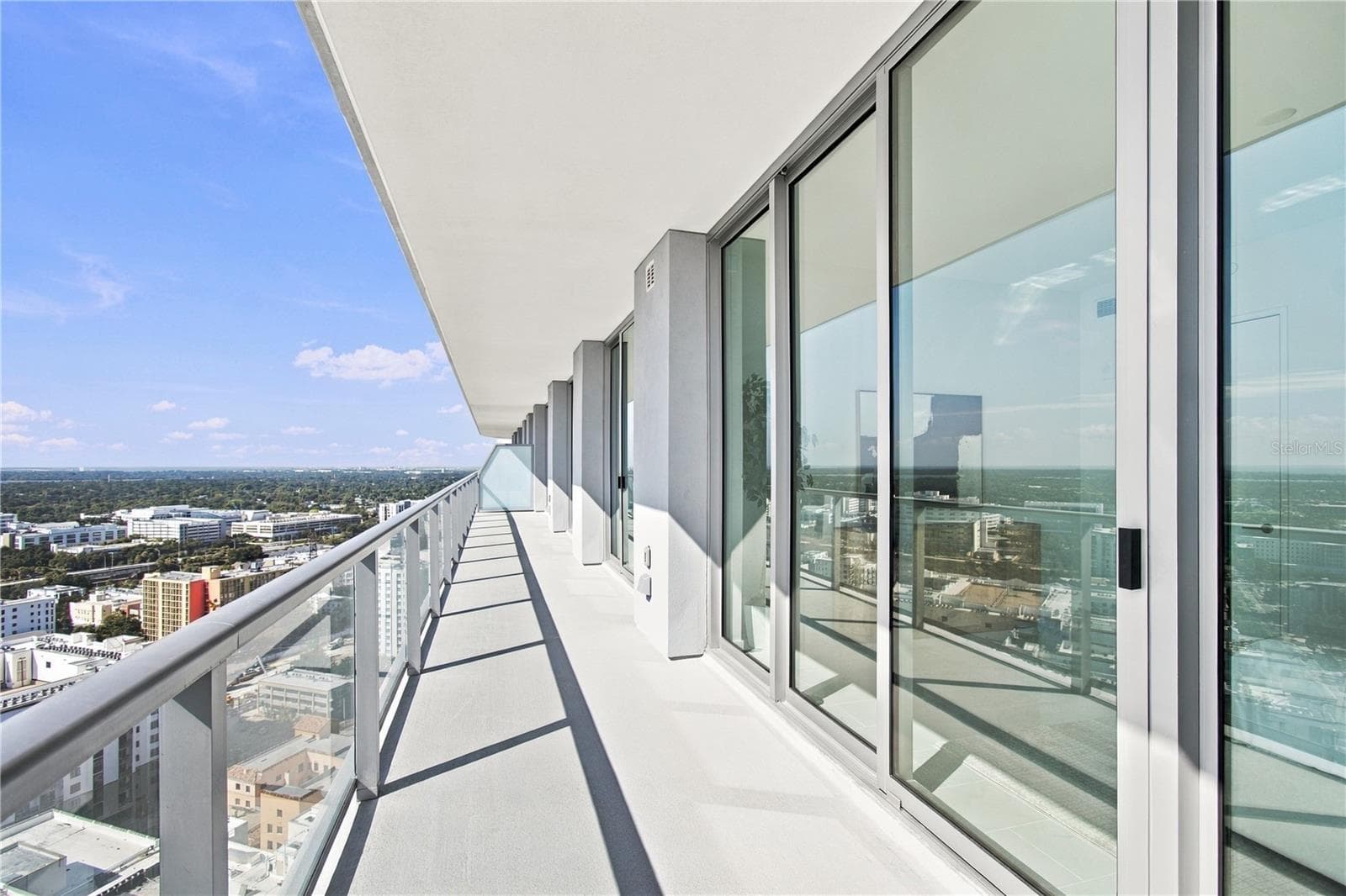 Full-length terrace extends approximately 60 feet along the residence with multiple points of access - 400 CENTRAL AVE #2505, ST PETERSBURG