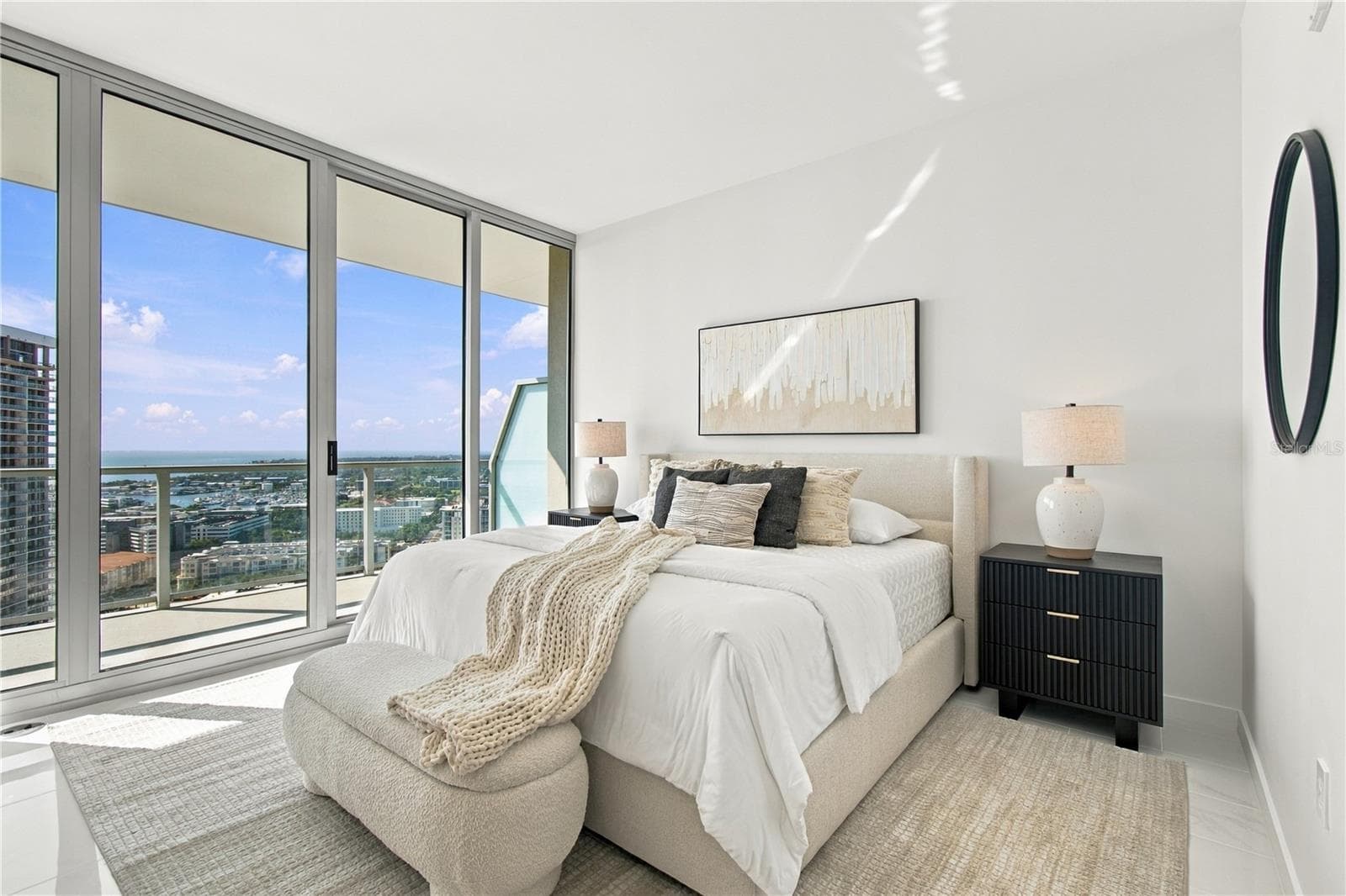 Floor-to-ceiling glass brings natural light and city views into the guest suite - 400 CENTRAL AVE #2505, ST PETERSBURG