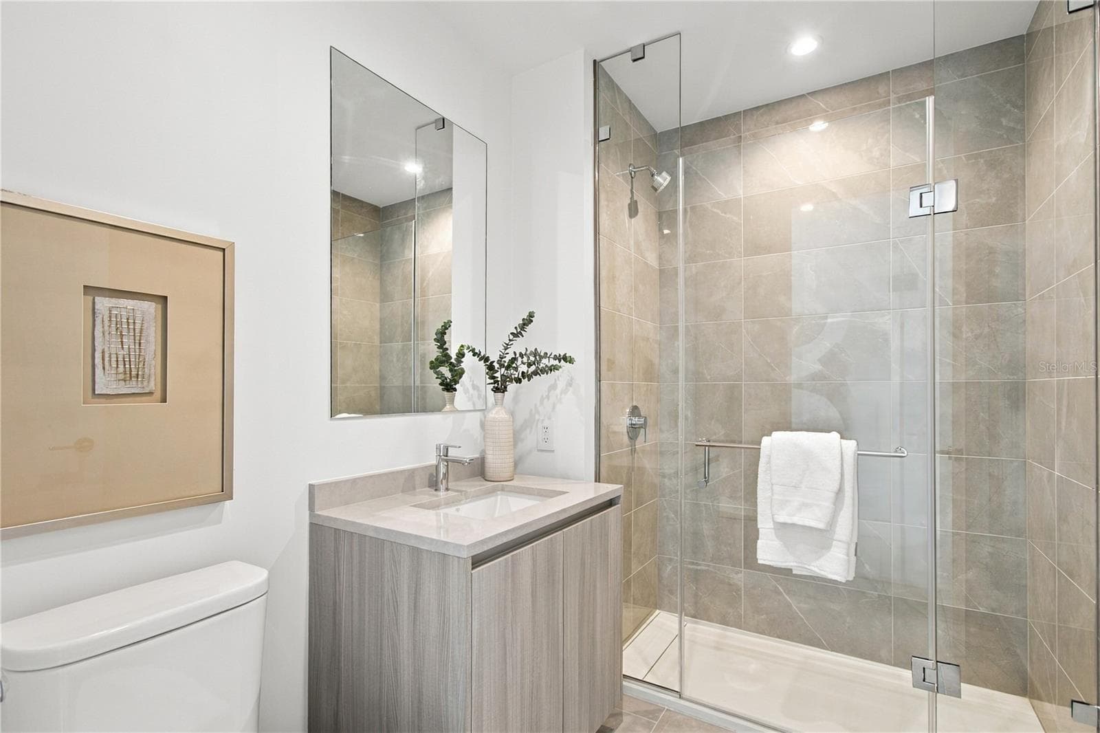 Third full bath is conveniently located off the main living area—ideal for guests and the optional third-bedroom configuration - 400 CENTRAL AVE #2505, ST PETERSBURG