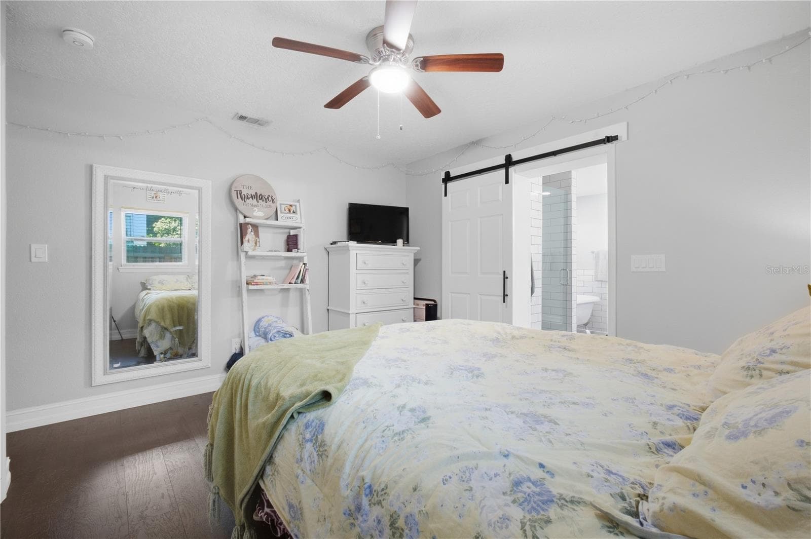 Barn door leading to large bathroom - 345 CANNON ST, LAKELAND