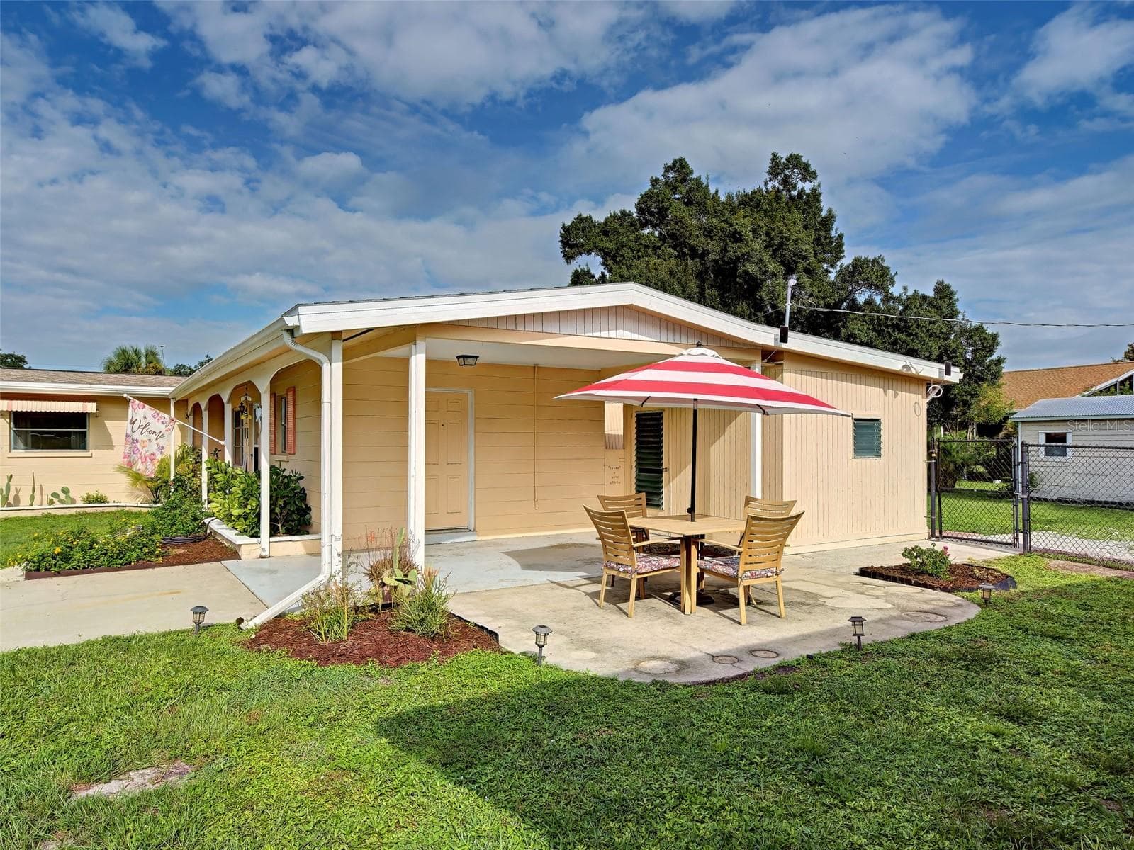 Side patio- entry to laundry - 22542 ELMIRA BLVD, PORT CHARLOTTE