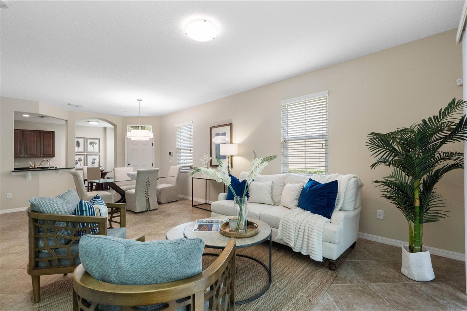 Open floorplan living and dining room - 7949 TASSO CT, SEMINOLE