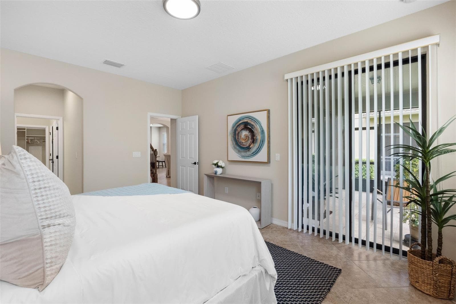 Primary bedroom, sliders going to the lanai - 7949 TASSO CT, SEMINOLE