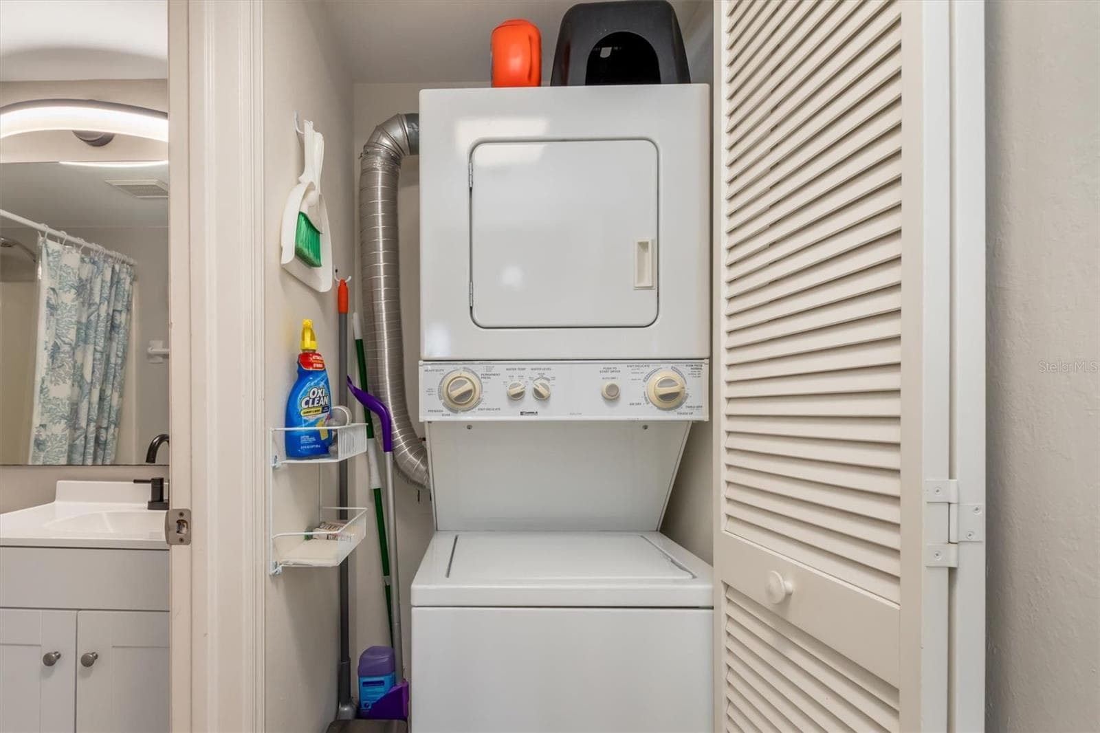 IN-UNIT LAUNDRY STACK WASHER DRYER - 3310 LOVELAND BLVD #1105, PUNTA GORDA