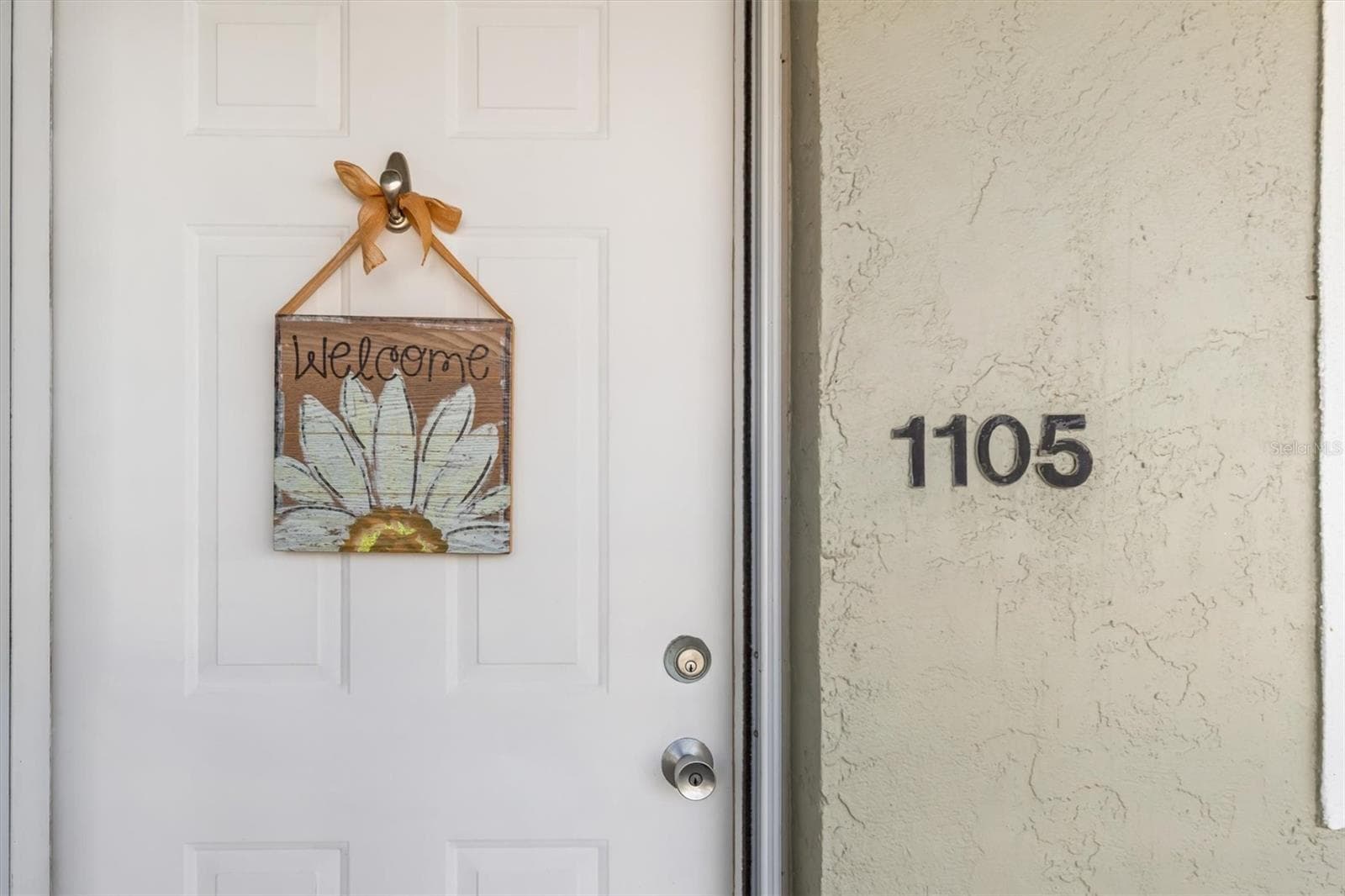 HOME SWEET HOMENEWER STORM DOOR WITH SCREENING - 3310 LOVELAND BLVD #1105, PUNTA GORDA